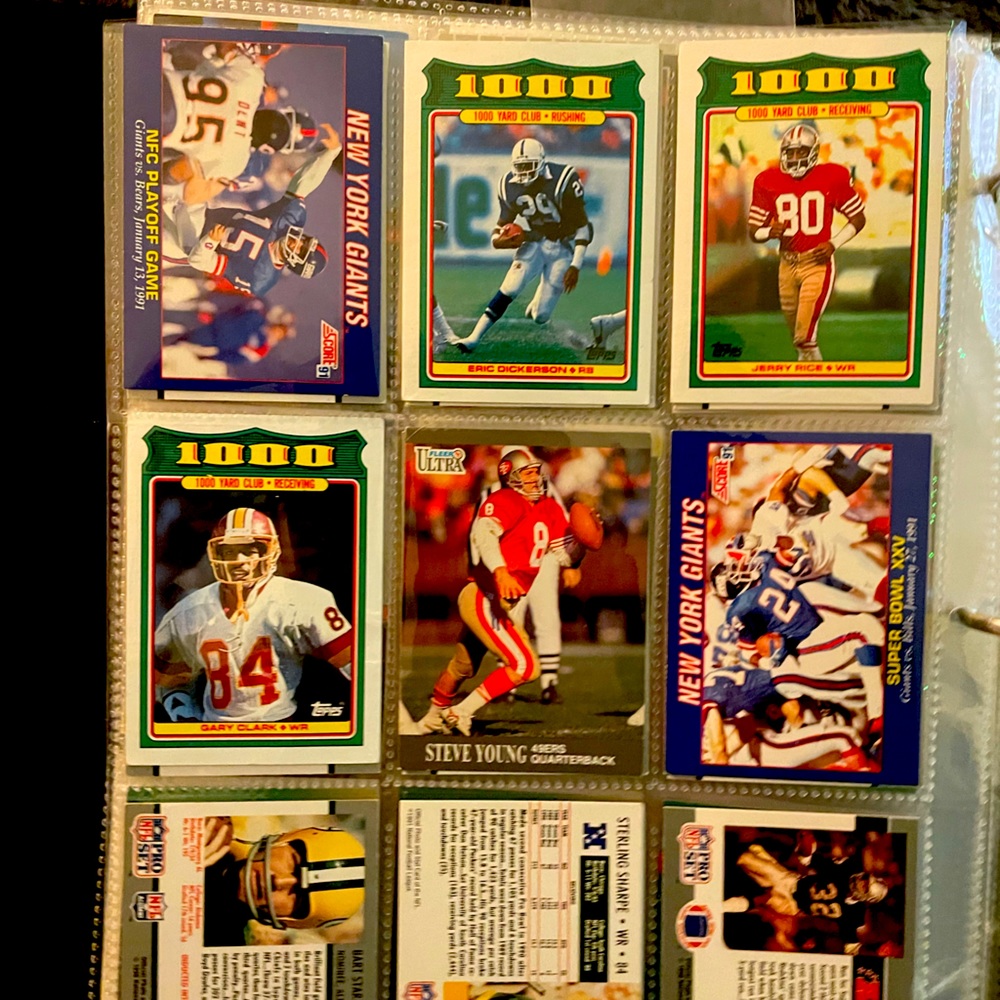 Around 1500 collectible football baseball basketball cards!